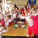Grimethorpe school children celebrate their finished mosaic.